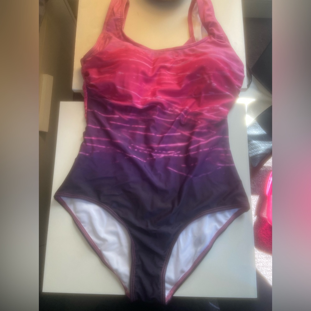 Exlura one piece stretchy bathing suit.  Medium